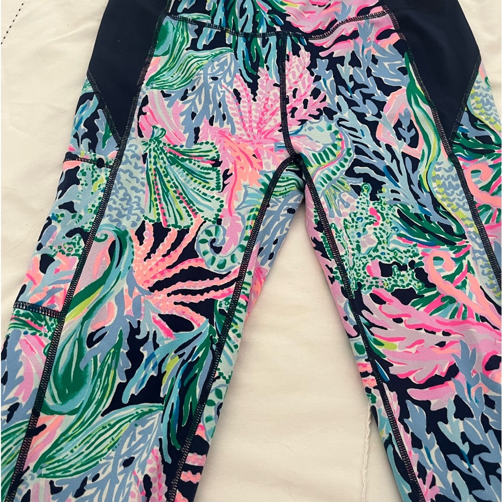 Lilly Pulitzer luxottica blue and pink floral print leggings.